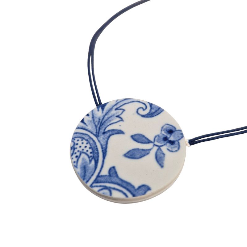 Pendentif bleu et blanc